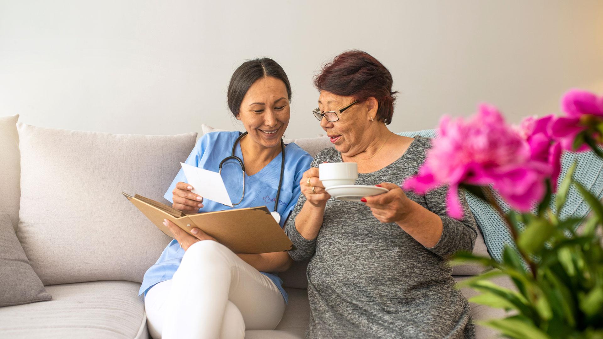 Nurse and patient reading and looking at pictures