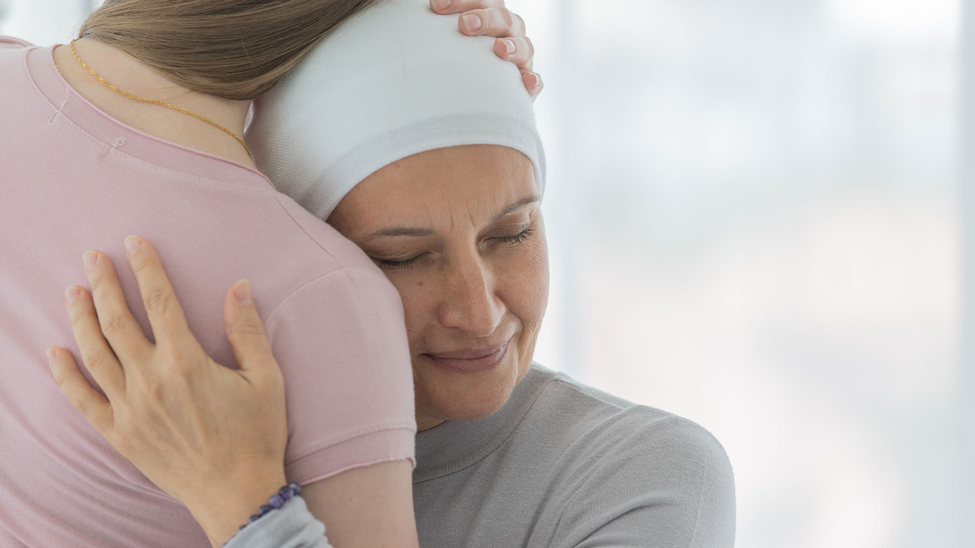 cancer patient hugging