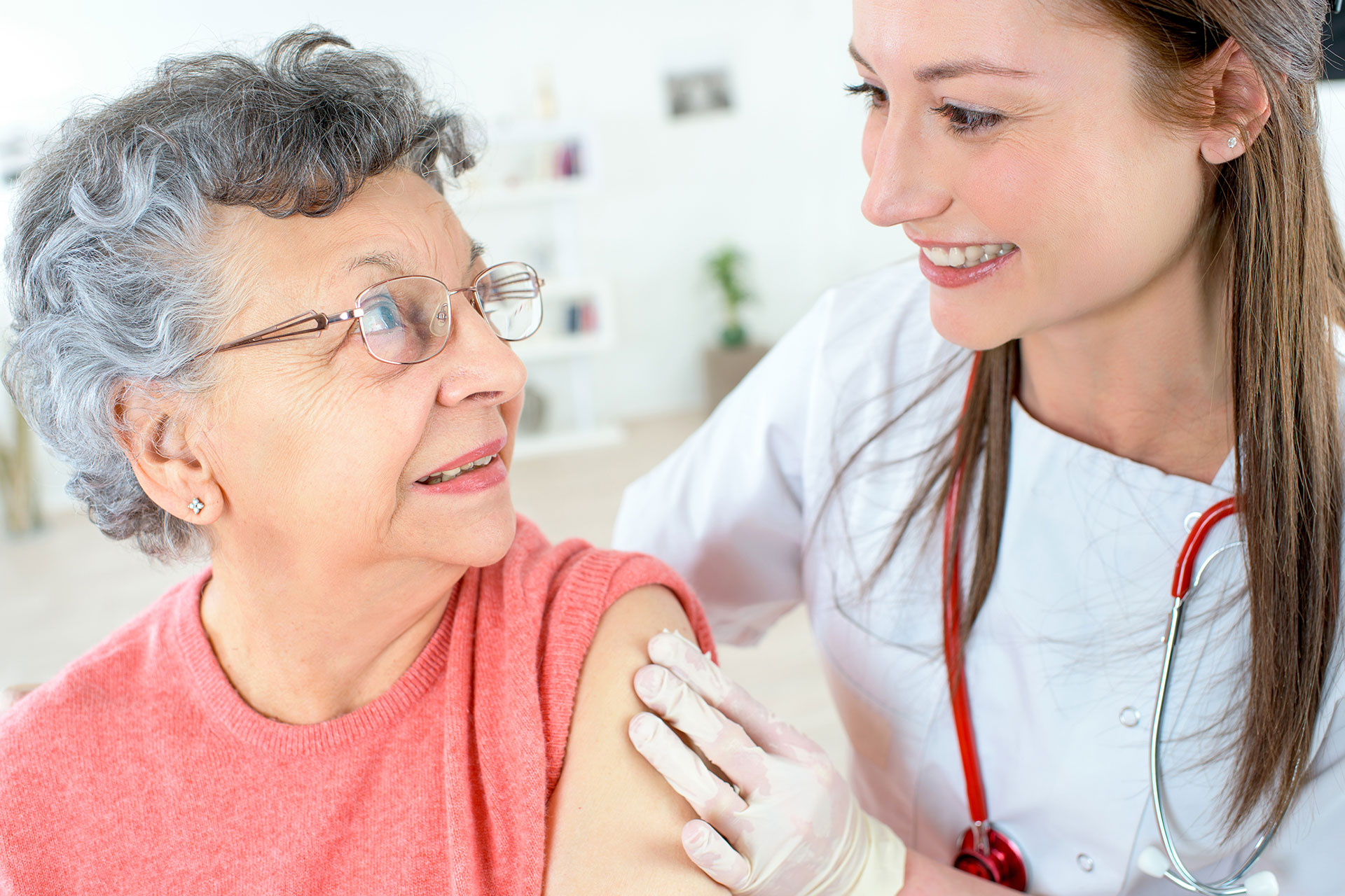 Hero-Flu-Shot-Woman Nurse taking care of thrombocytopenia patient