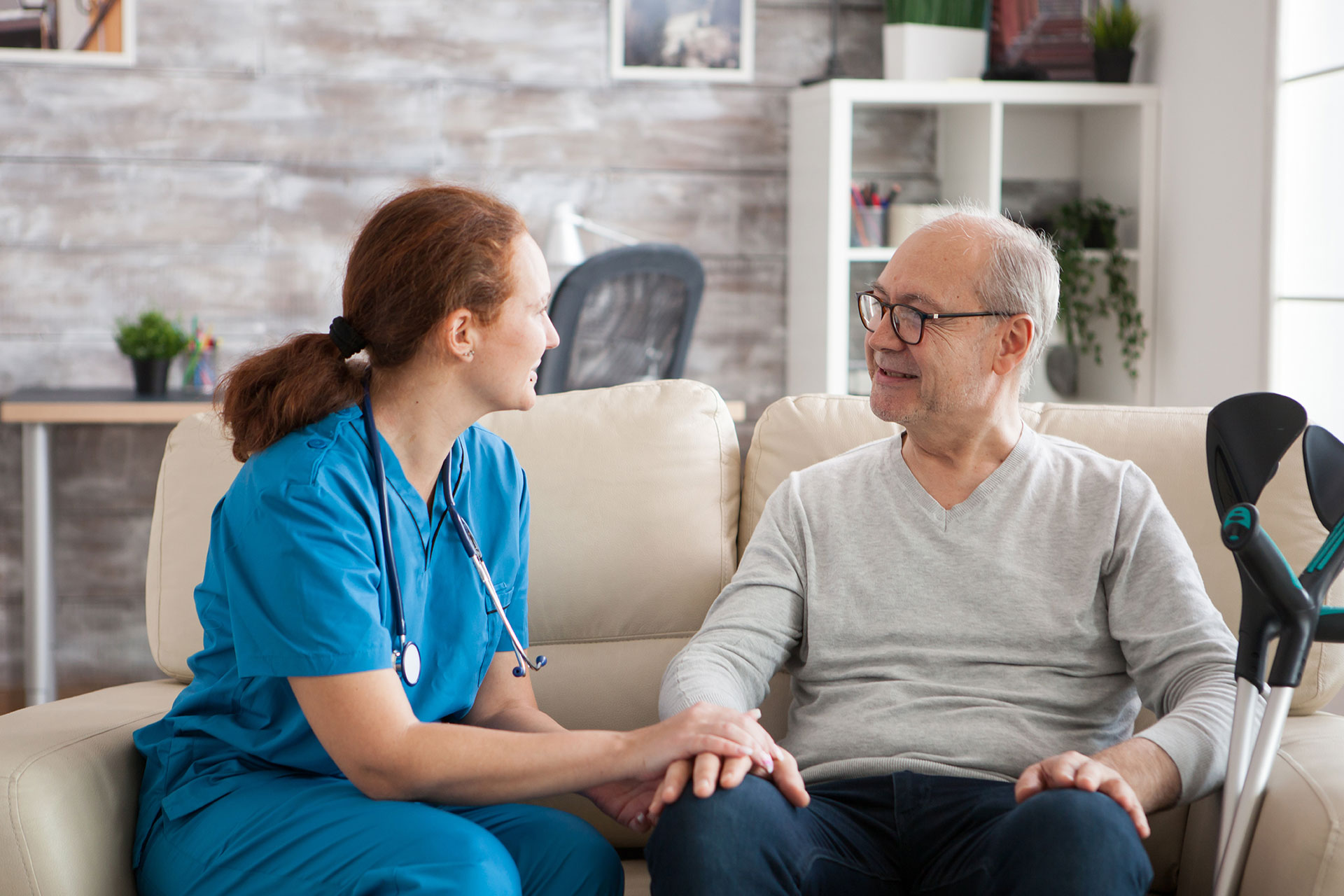 Nurse helping fibromyalgia patient 