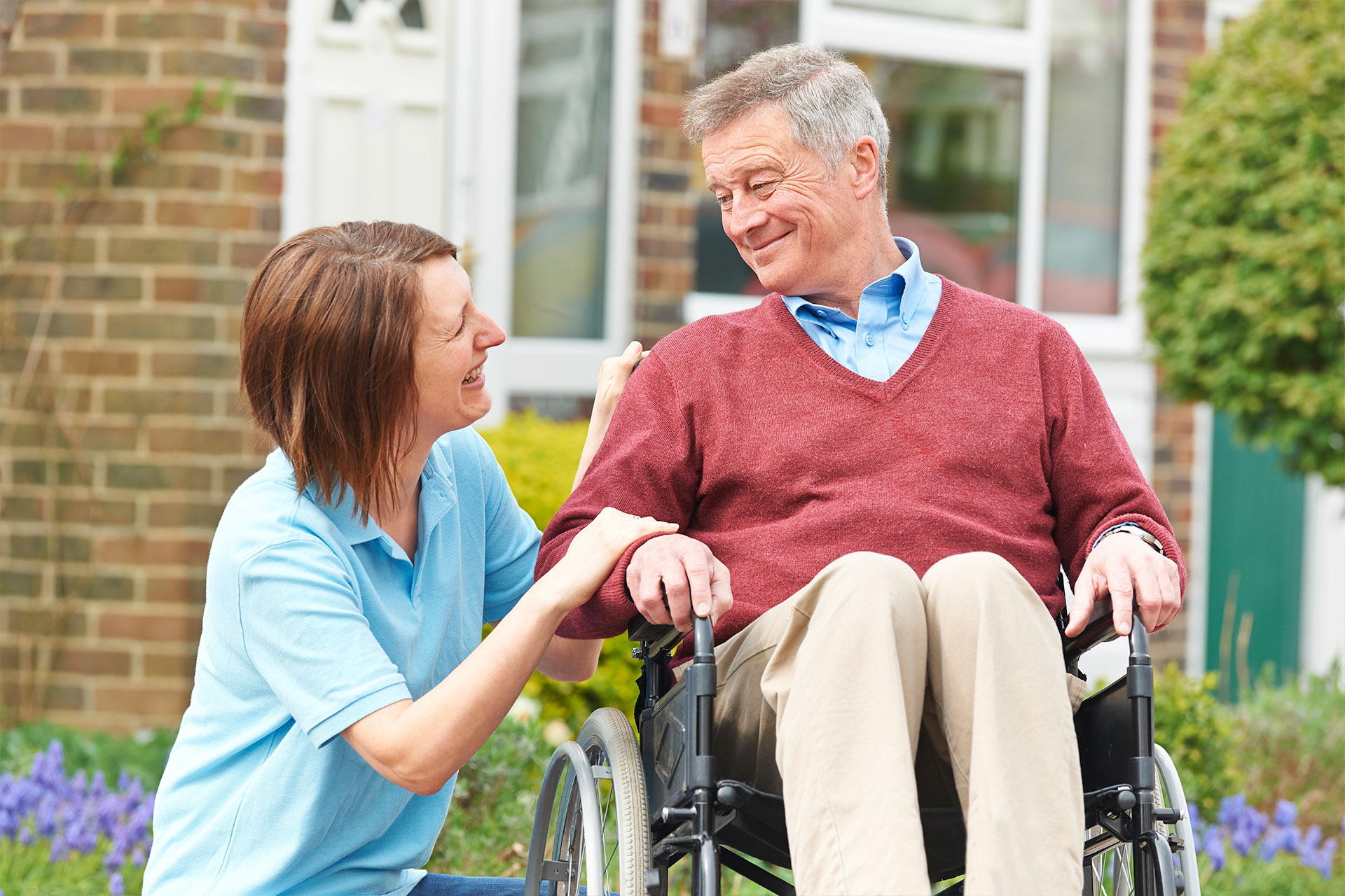 home health nurse helping Alzheimer’s patient