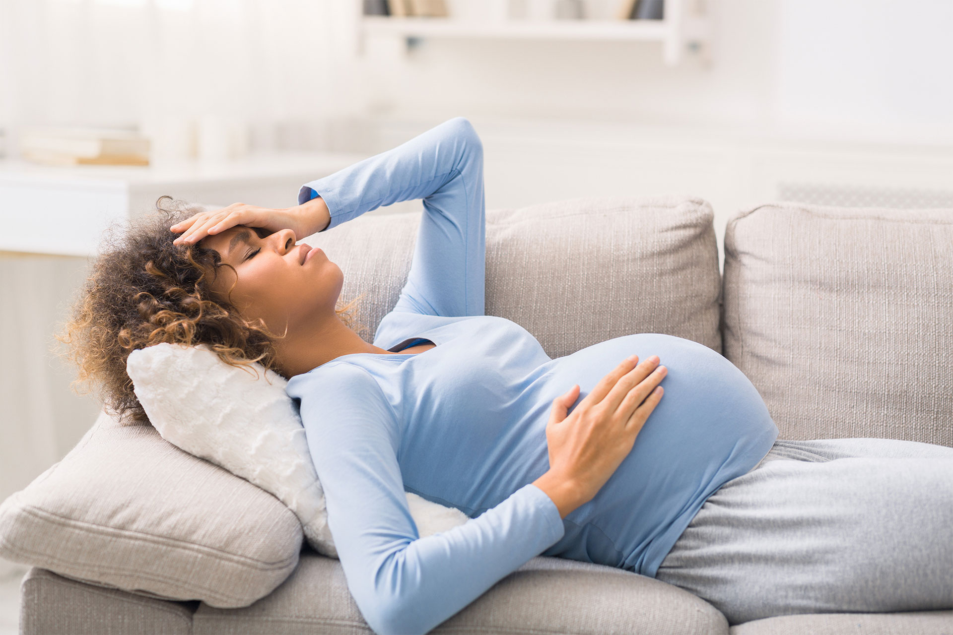 Pregnant woman having a headache