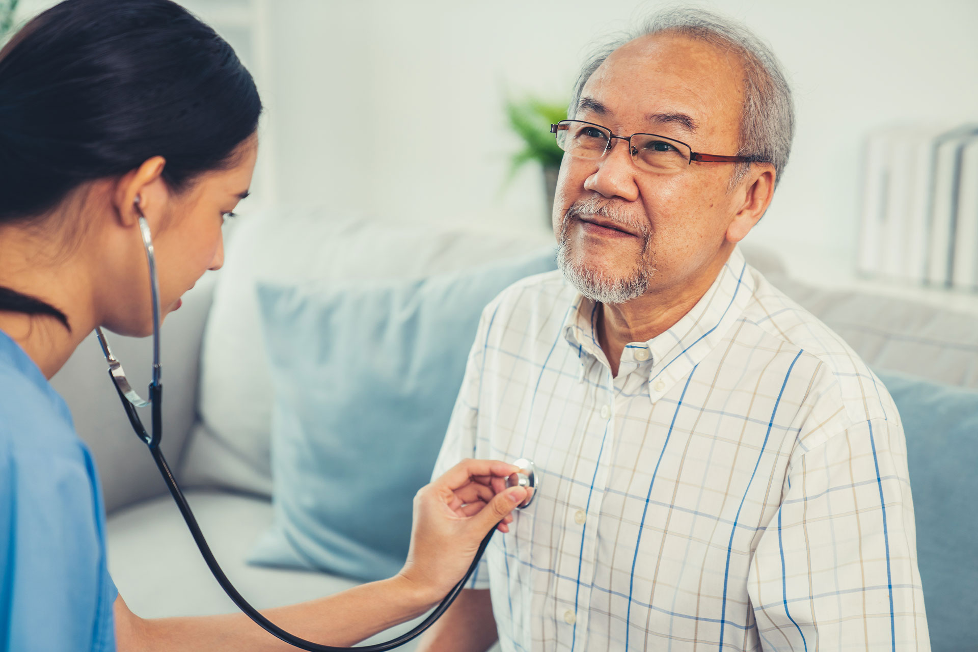 nurse helping patient with cardio rehabilitation care