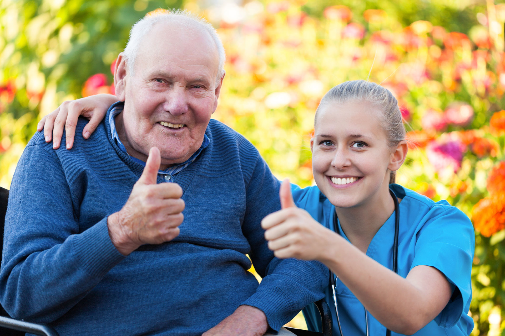 Hero-Nurse-Happy-Home-Healthcare Nurse and patient giving a thumbs up to getting vaccinated