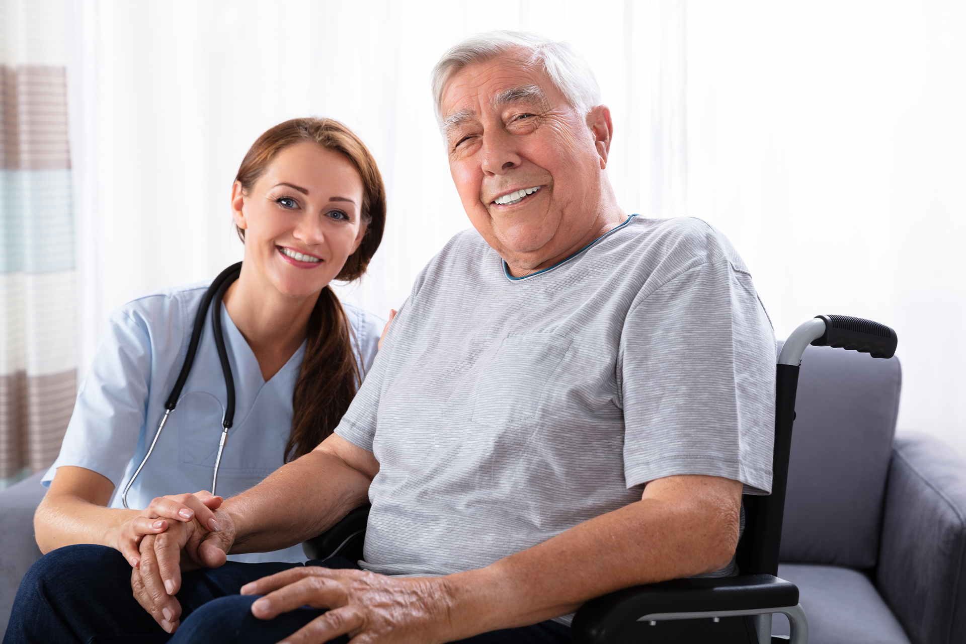 Nurse and patient smiling