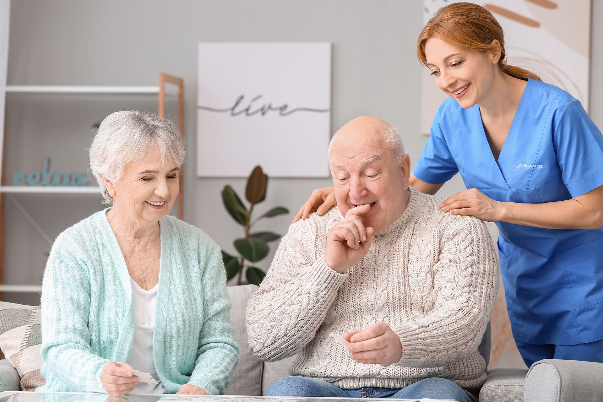 home nurse cheering patient on while doing a puzzle