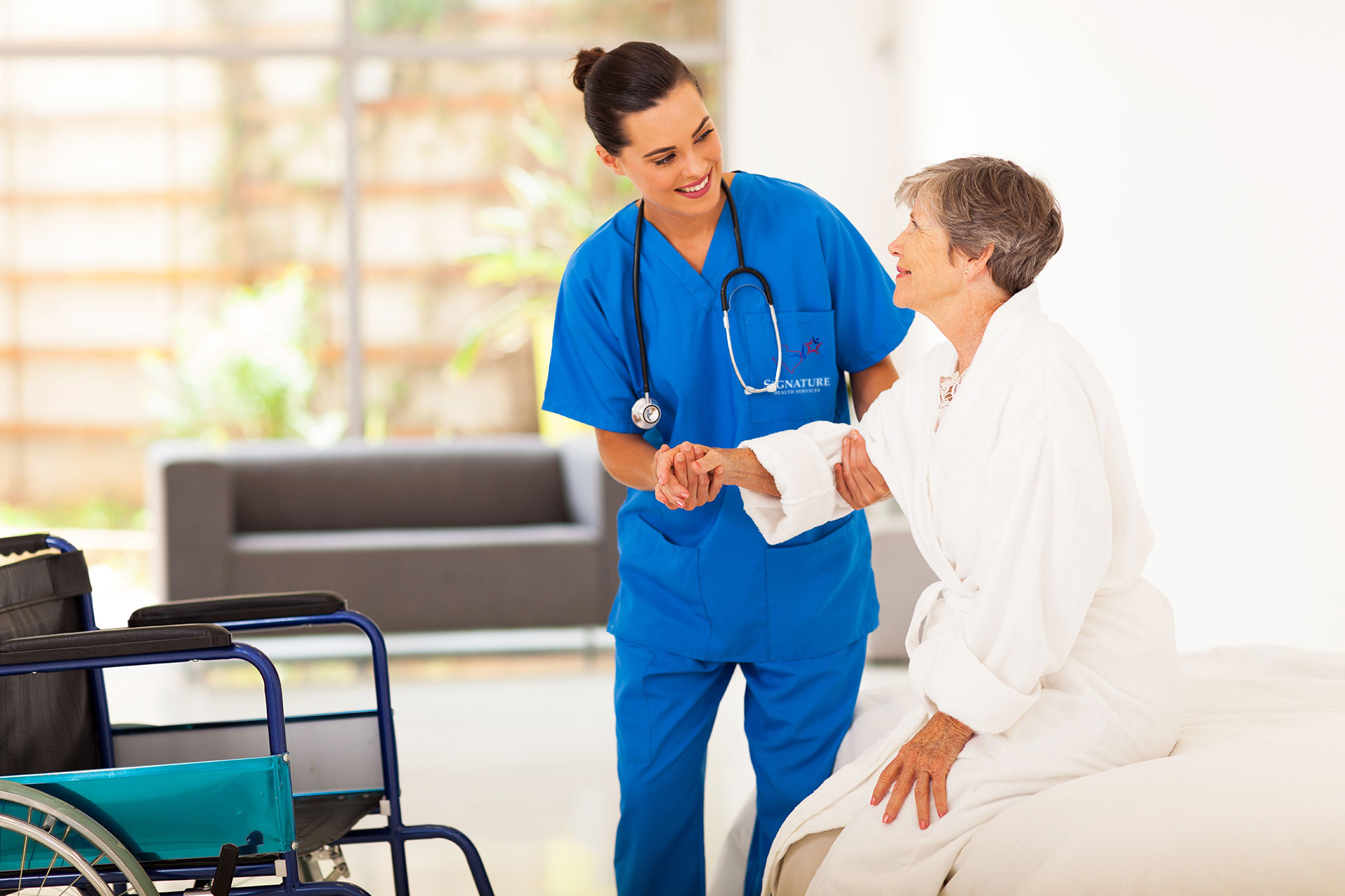 home nurse helping women up from the bed